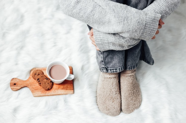 Crop shot of girl freezing on winter time