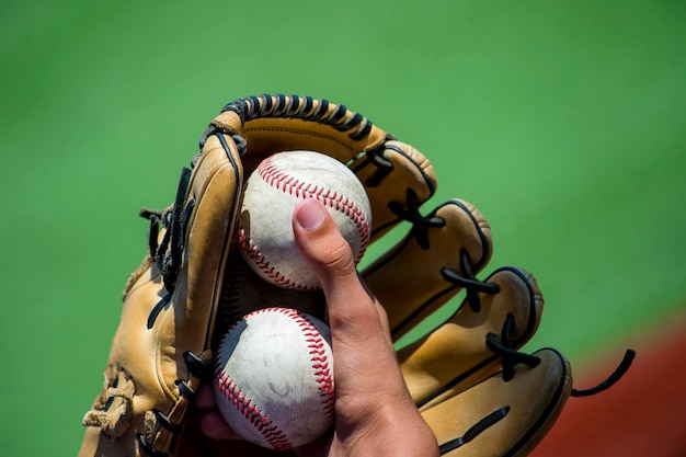 Photo cropped hand holding baseball ball