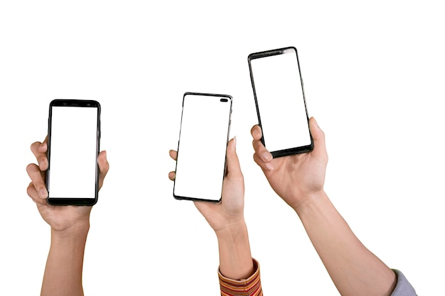 Cropped hand holding smart phones against white background