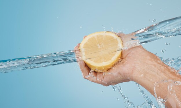 Cropped hand holding water