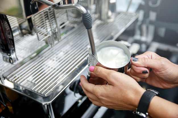 Cropped hand of man preparing food