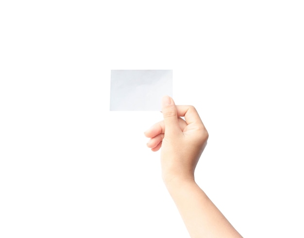 cropped hand of person holding blank paper against white background