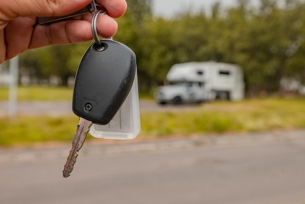 Photo cropped hand of person holding car