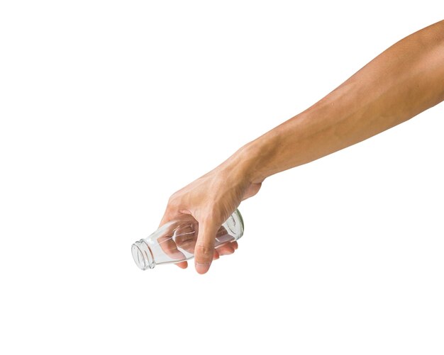 Photo cropped hand of person holding empty bottle against white background