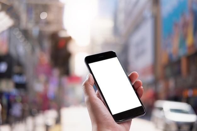 Cropped hand of person holding smart phone