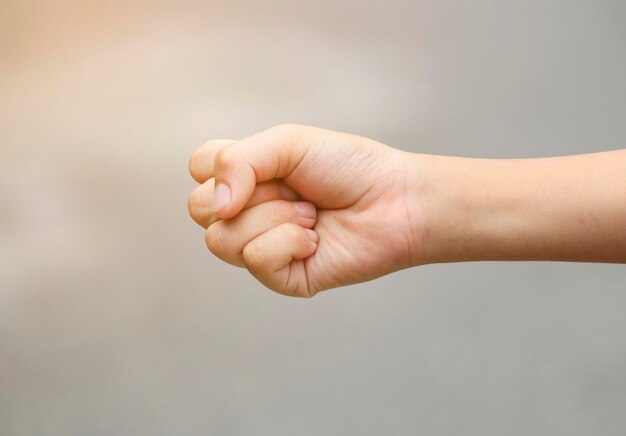 Photo cropped hand of person showing fist