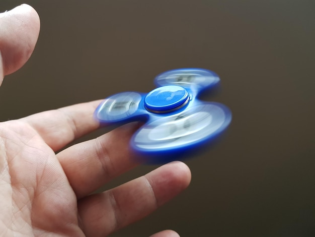 cropped hand spinning fidget spinner