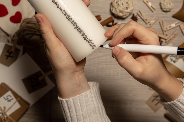 cropped hand of woman holding thermometer