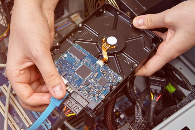 Photo cropped hands assembling cpu