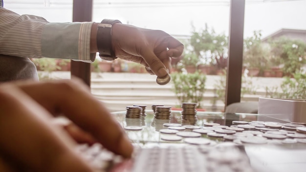 Photo cropped hands counting coins