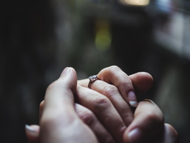 Cropped hands of couple