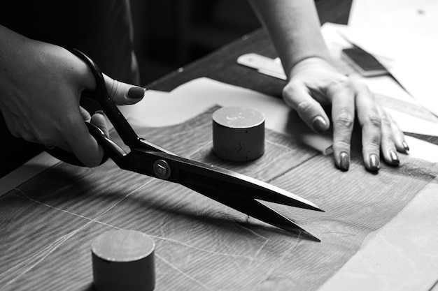 Cropped hands of man working on table