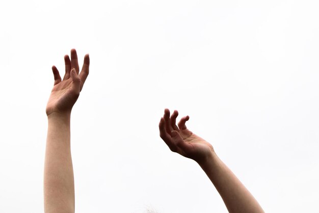 Photo cropped hands of people against white background