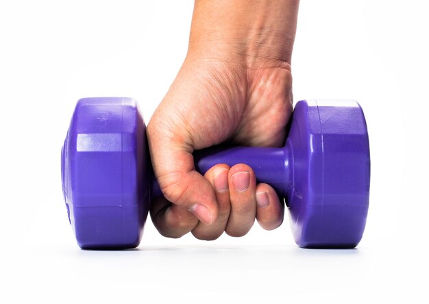 Photo cropped hands of people holding dumbbells against white background