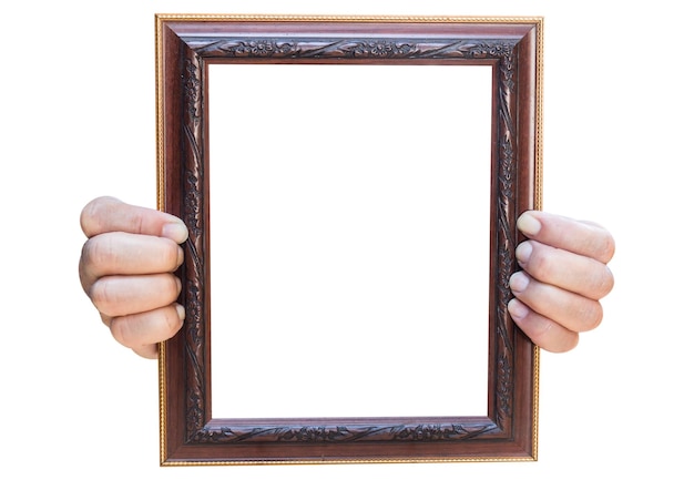 Photo cropped hands of person holding blank picture frame against white background
