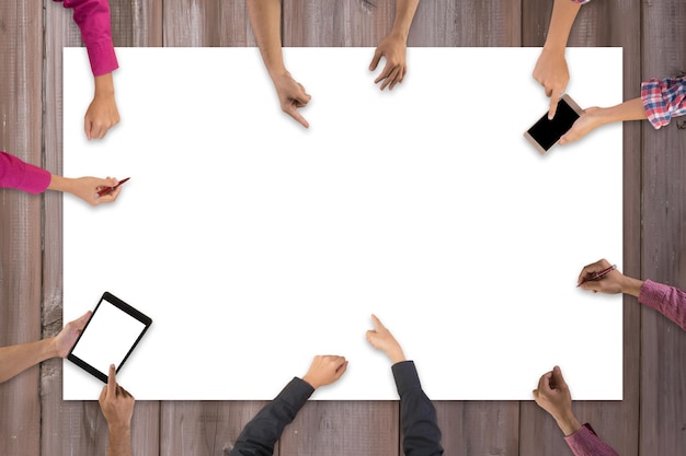 Photo cropped image of business colleagues having meeting on conference table in office