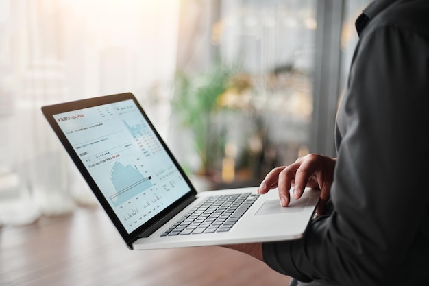 Cropped image of a business man using a laptop