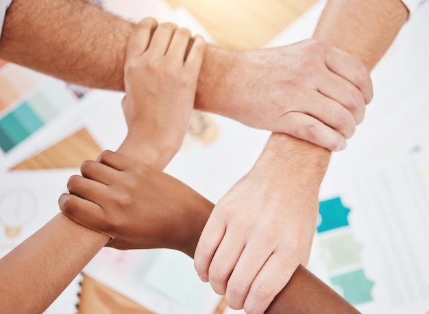 Cropped image of couple holding hands