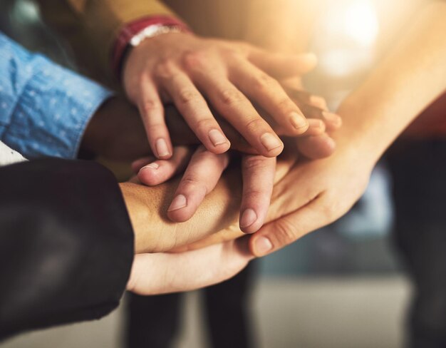 Cropped image of couple holding hands