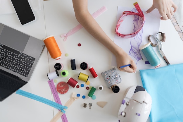 Cropped image of a female fashion designer Currently working on creating new clothing collections