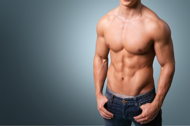 cropped image of fit muscular body of sportsman