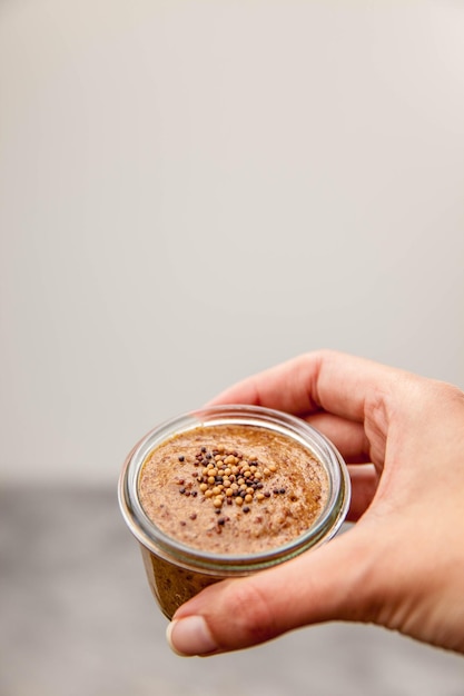 Cropped image of hand holding food