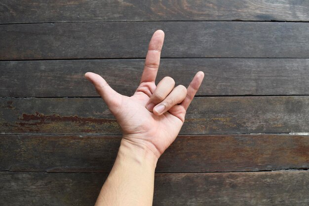 Cropped image of hand on table