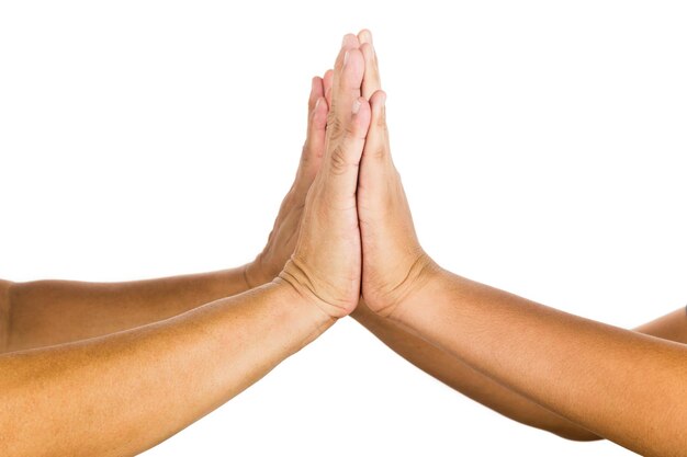 Photo cropped image of hands high-fiving against white background