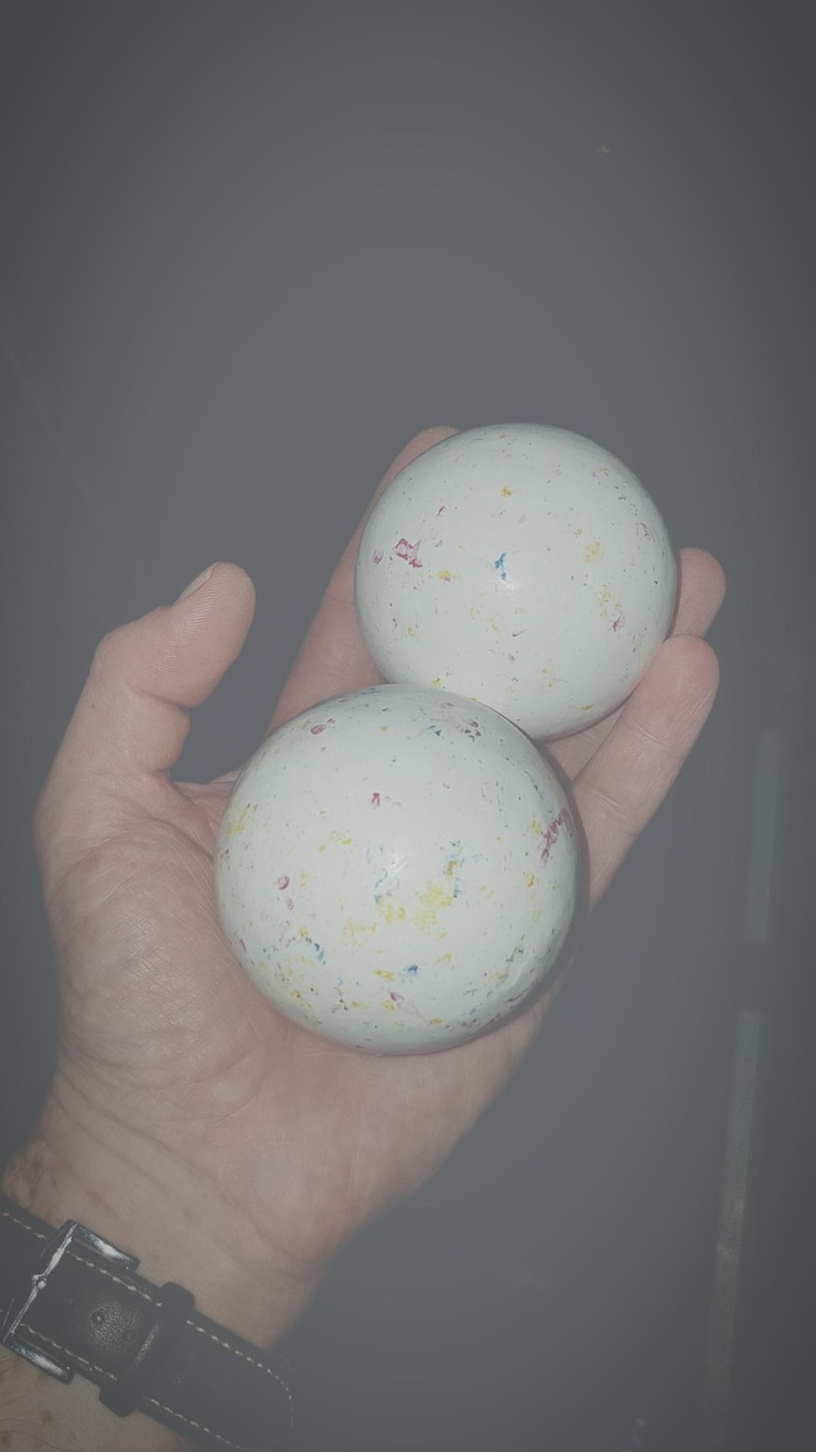 Photo cropped image of holding jawbreakers