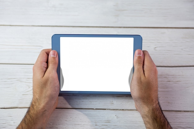 Photo cropped image of person holding tablet