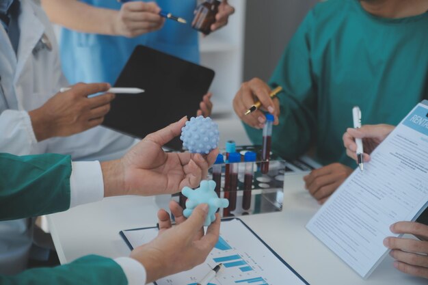 Cropped image of successful medical doctors discussing diagnosis during the conference