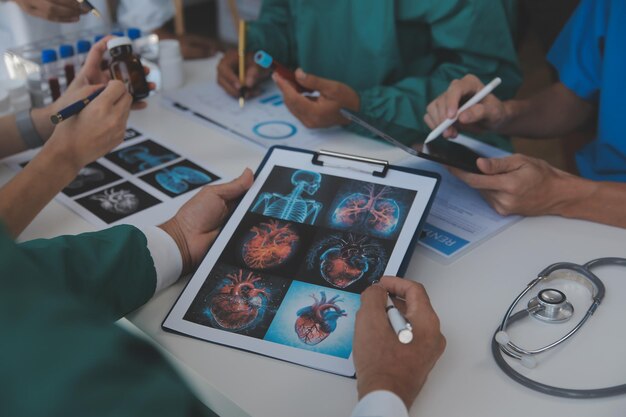 Cropped image of successful medical doctors discussing diagnosis during the conference