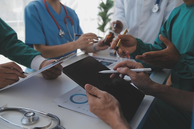 Cropped image of successful medical doctors discussing diagnosis during the conference