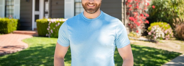 Cropped man standing on background of house ownership