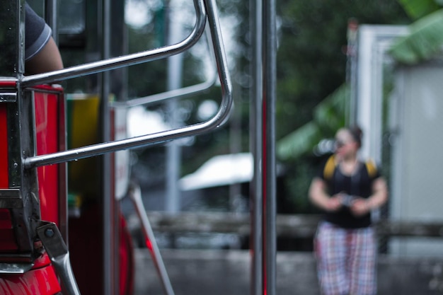 Cropped person on bus in city