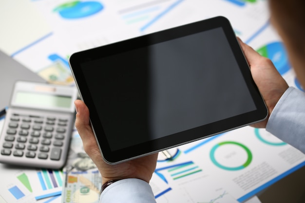 Cropped photo of businessman making report in office