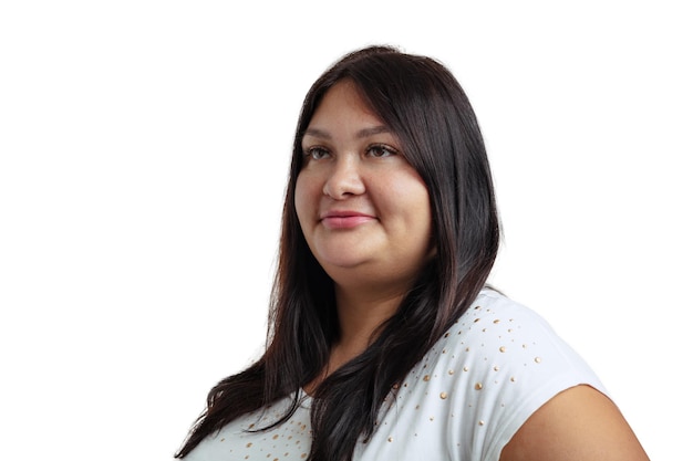 Cropped portrait of darkhaired owman without makeup posing isolated over white background