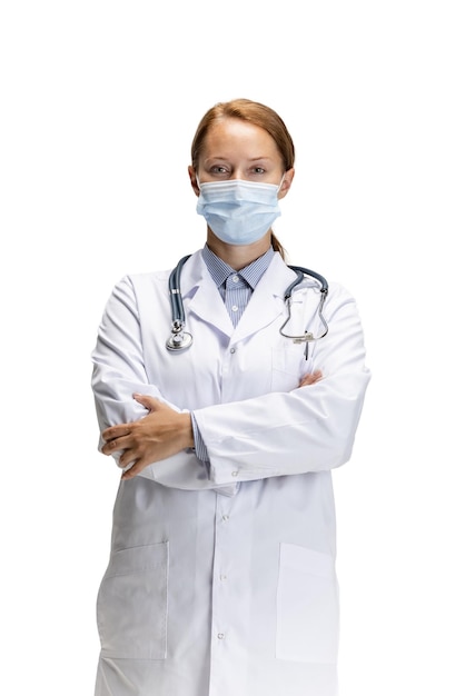 Cropped portrait of woman doctor in protective mask isolated over white background