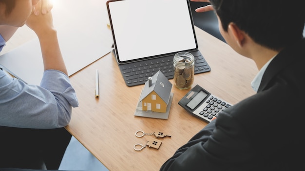 Cropped shot of Business people consulting about interest to invest in real estate