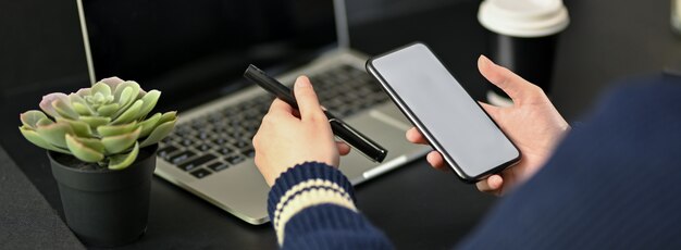 Cropped shot of businesswoman working with digital tablet