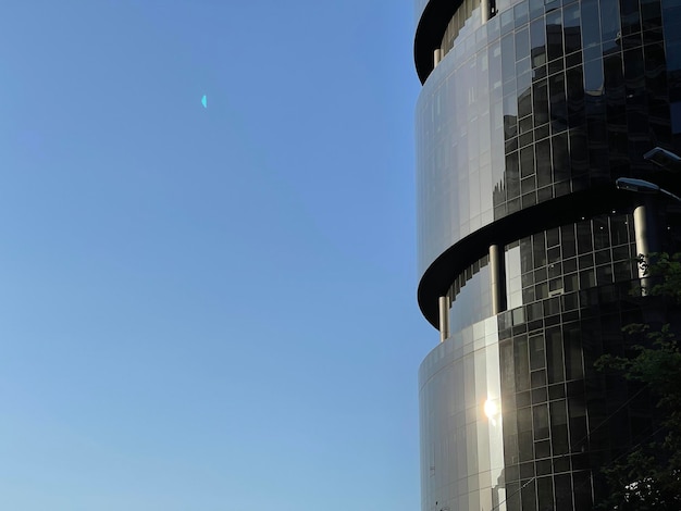 Cropped shot of a modern business center building with black glass windows