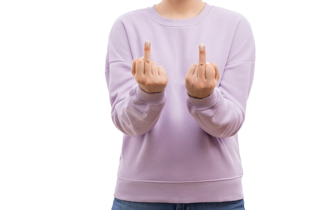 Cropped shot of a woman in a lavander oversized sweatshirt showing the middle finger