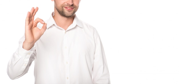 cropped view of businessman showing okay sign isolated on white