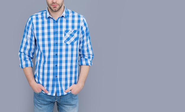 Cropped view of guy having stubble guy in checkered shirt isolated on grey background