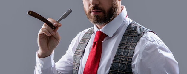 Cropped view of man shave with barber blade man barbering in barber studio