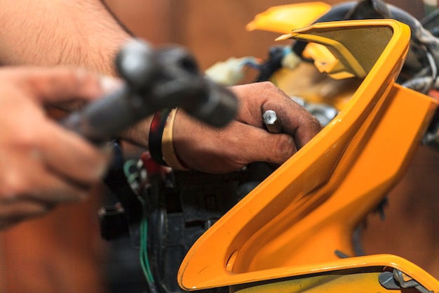 Cropped view of Motorcycle mechanic,Technician 