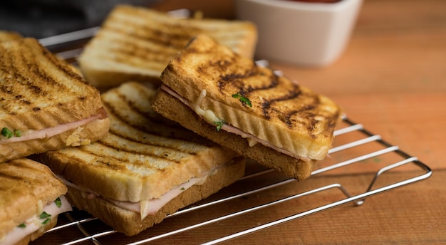 Croque Monsieur French toast with cheese ham and parsley a delicious snack closeup