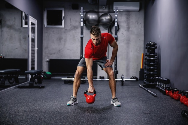 Cross fit training with kettle bell lifting