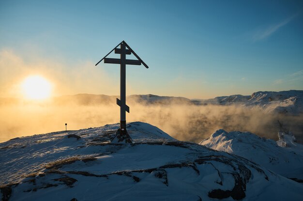 Cross on the kola peninsula cold dawn in teriberka