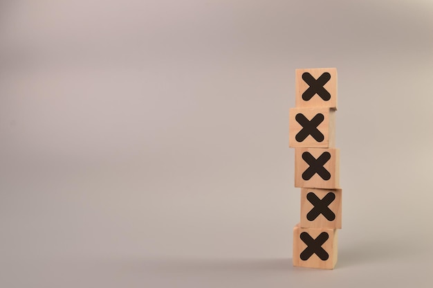 Photo cross marks on wooden blocks with copy space